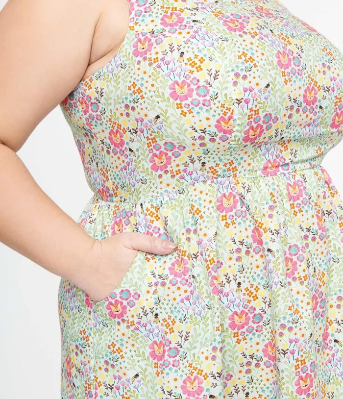 Retrolicious Plus Size 1950s Green Floral Cat Print Fit and Flare Dress DressesPlus Unique Vintage Pocket Dresses