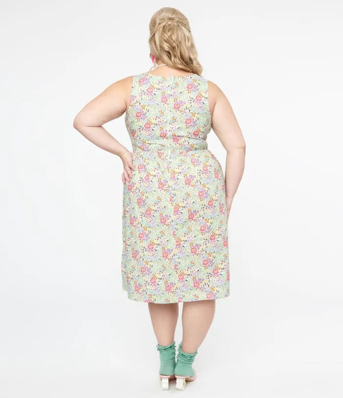 Retrolicious Plus Size 1950s Green Floral Cat Print Fit and Flare Dress DressesPlus Unique Vintage Pocket Dresses